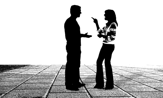 Two people communicating attentively, illustrating active listening